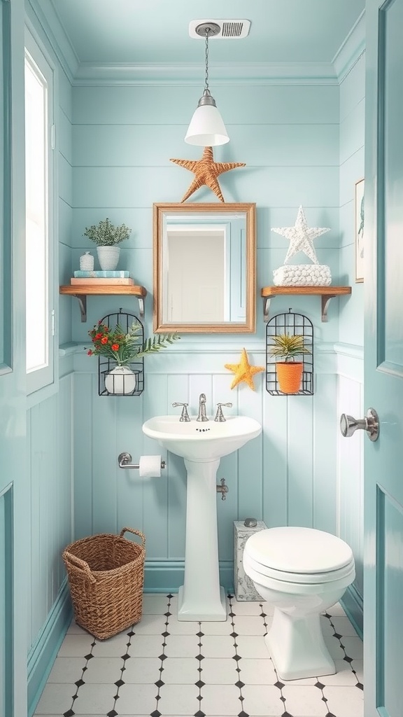 Small bathroom with light blue walls, a pedestal sink, decorative items, and coastal accents.