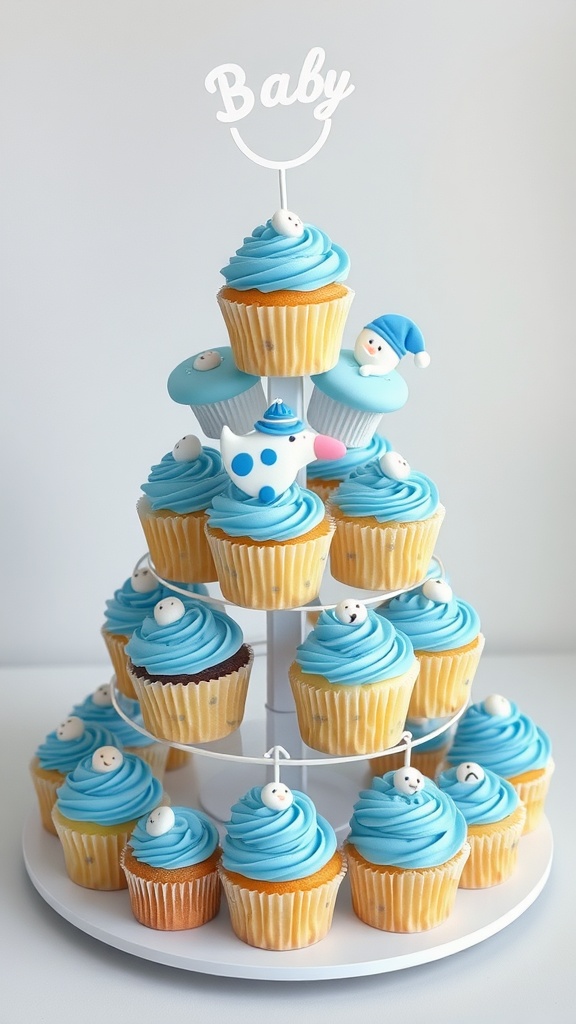 Cupcake tower for a baby boy shower with blue frosting and cute decorations