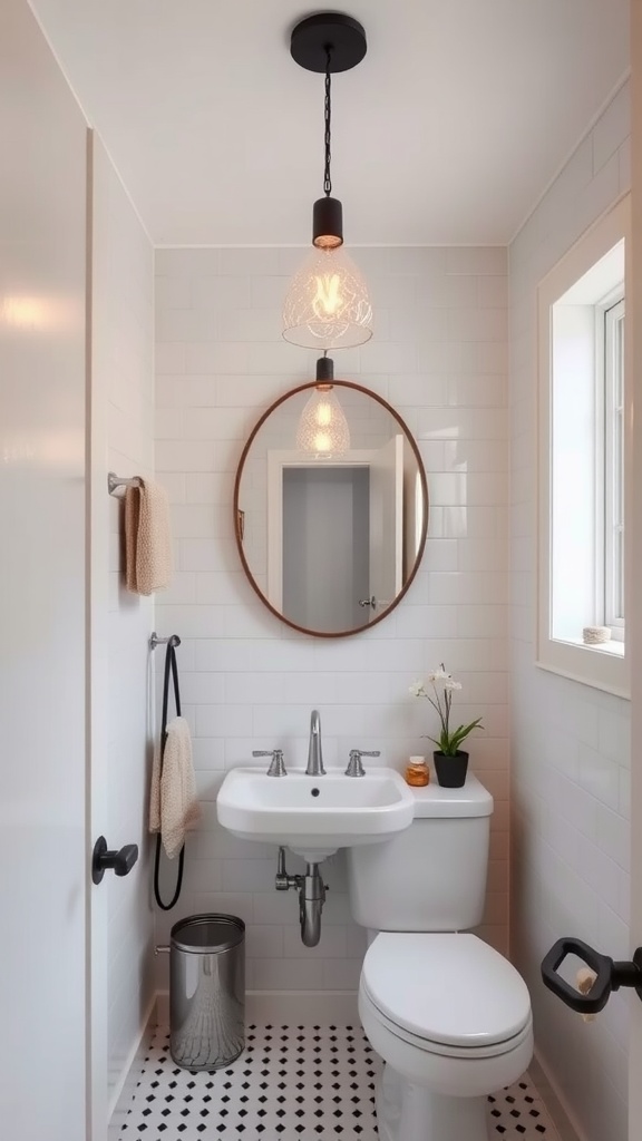 A small modern bathroom featuring stylish lighting fixtures, including a pendant light and a round mirror.